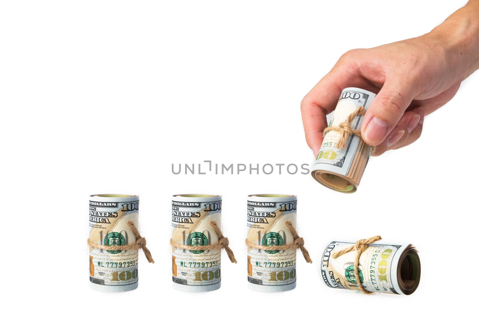 hand picking an usd isolated on white background