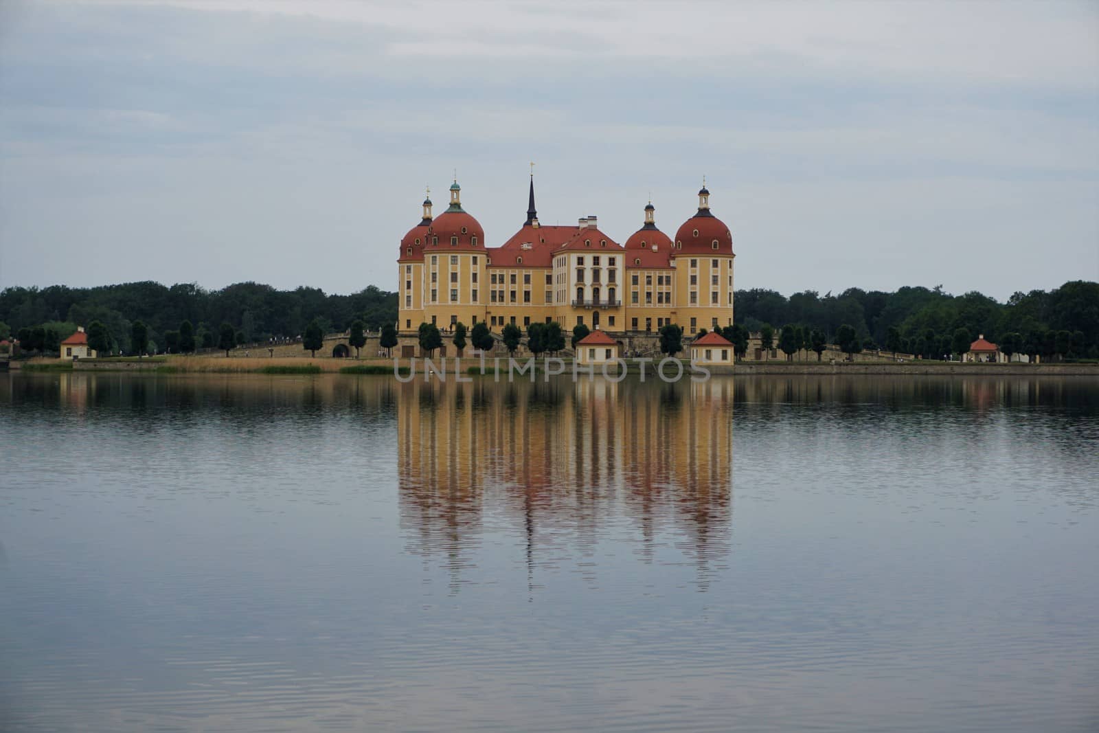 Moritzburg palace and beautiful reflections of the castle in the surrounding lake