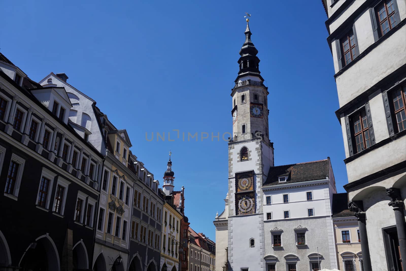 The Old Town Hall with the moon phase clock and restaurated houses surrounding the Lower Market Square
