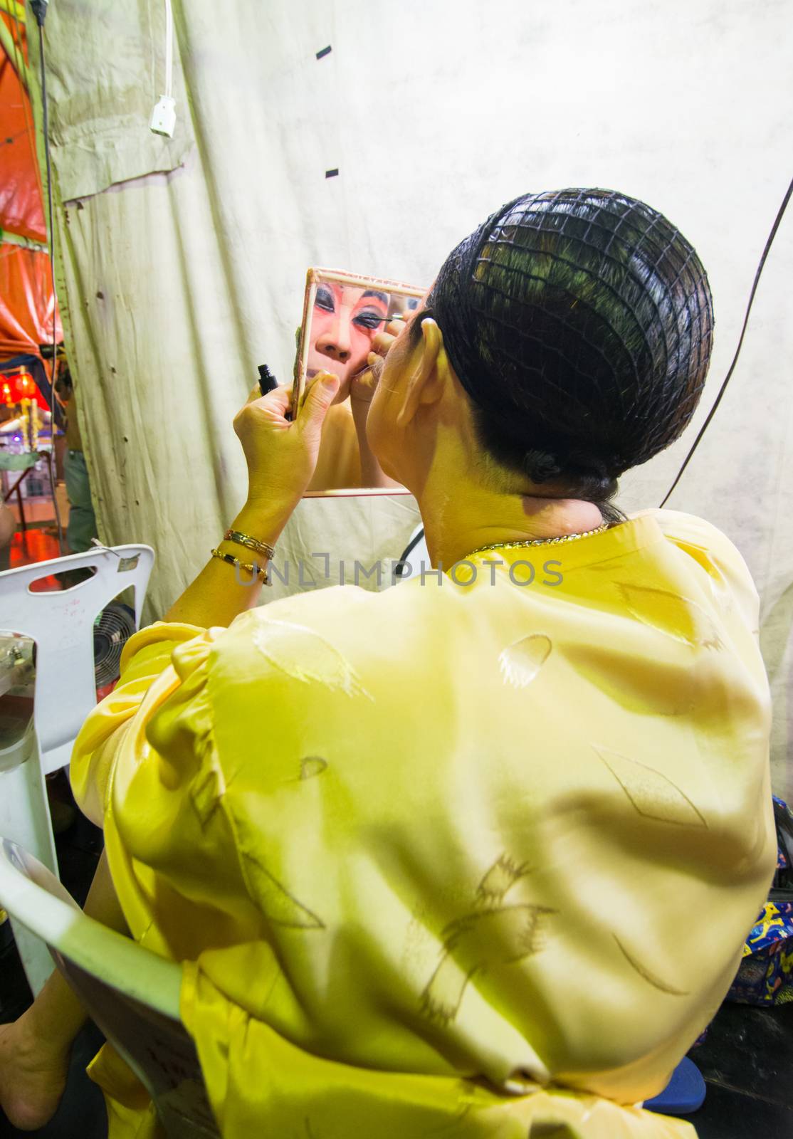 Asia / Thailand - August 28th 2019 : Chinese Opera Actress. Performers make up at backstage. 