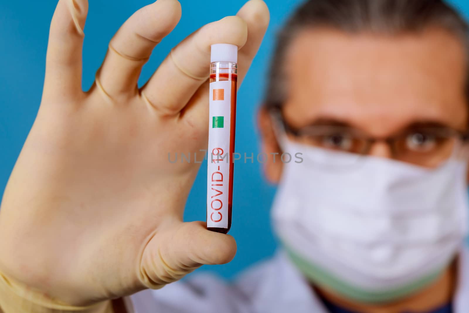 Medical working with blood sample a COVID-19 coronavirus laboratory medical clinic