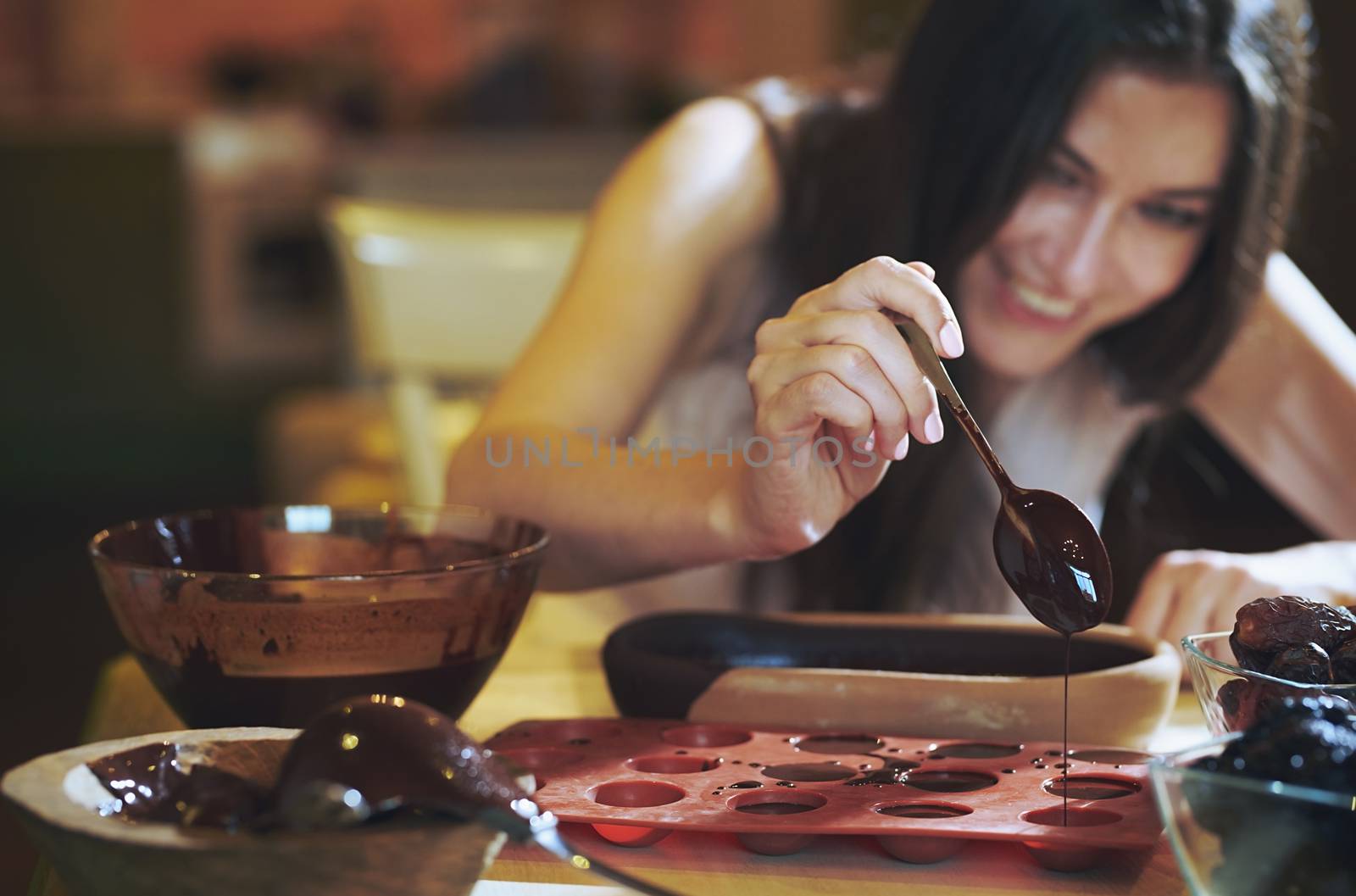 Staying at home woman preparing handmade vegetarian chocolate tr by Novic