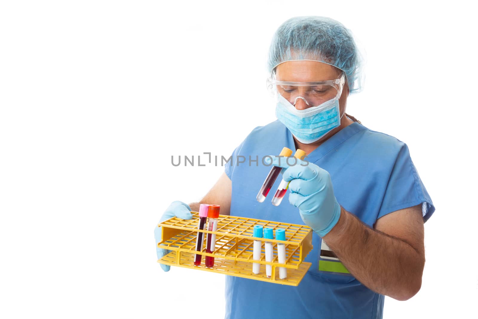 Hospital healthcare worker, pathologist or nurse carrying blood test samples in a test tube rack