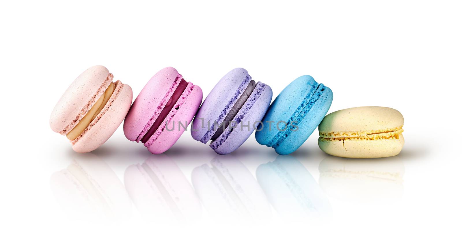 Five multicolored macaroons ladder in row by Cipariss