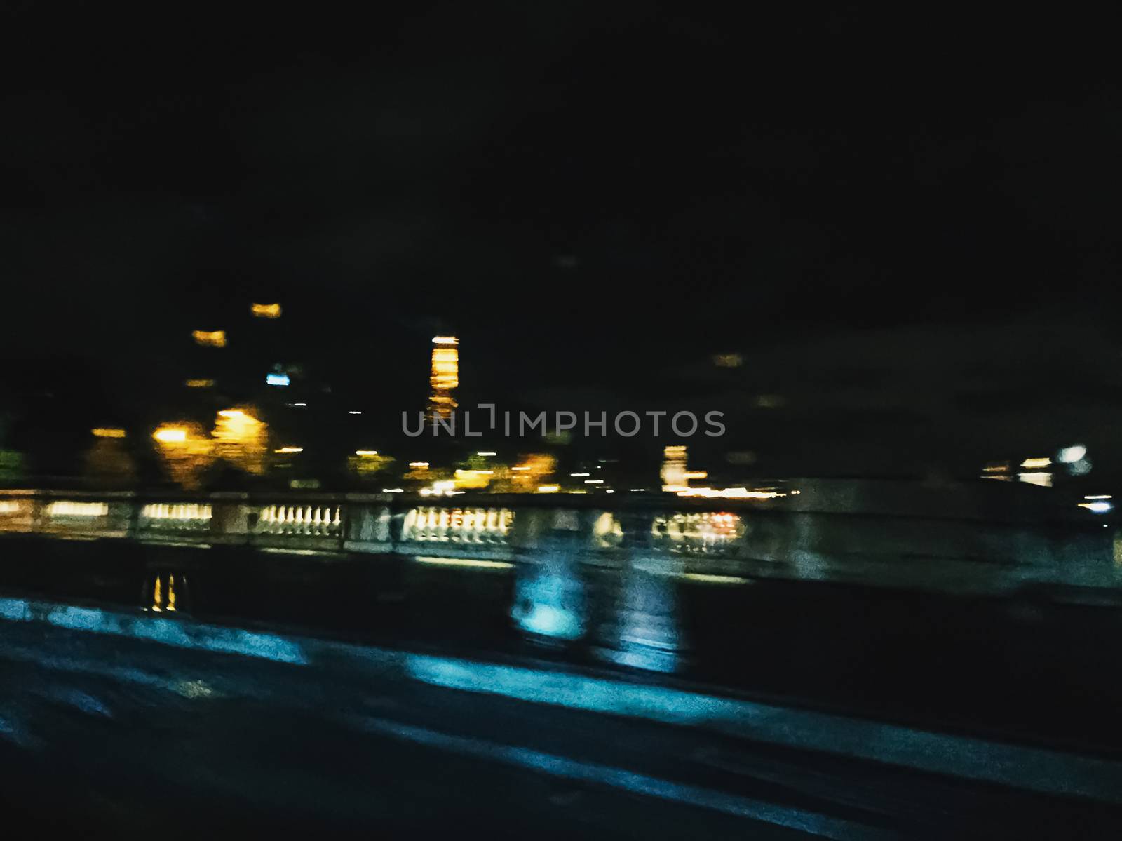 Abstract night city scene in Paris, France, motion blurred lights by Anneleven