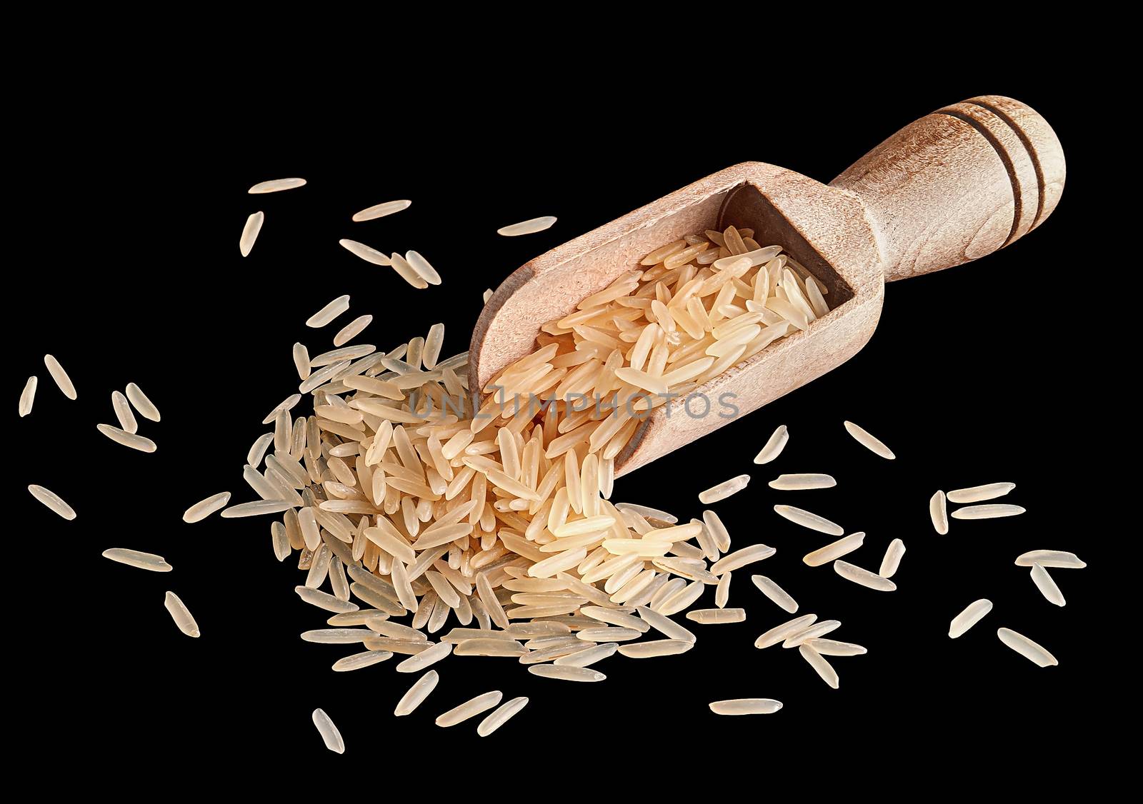 Rice in a wooden scoop by Cipariss