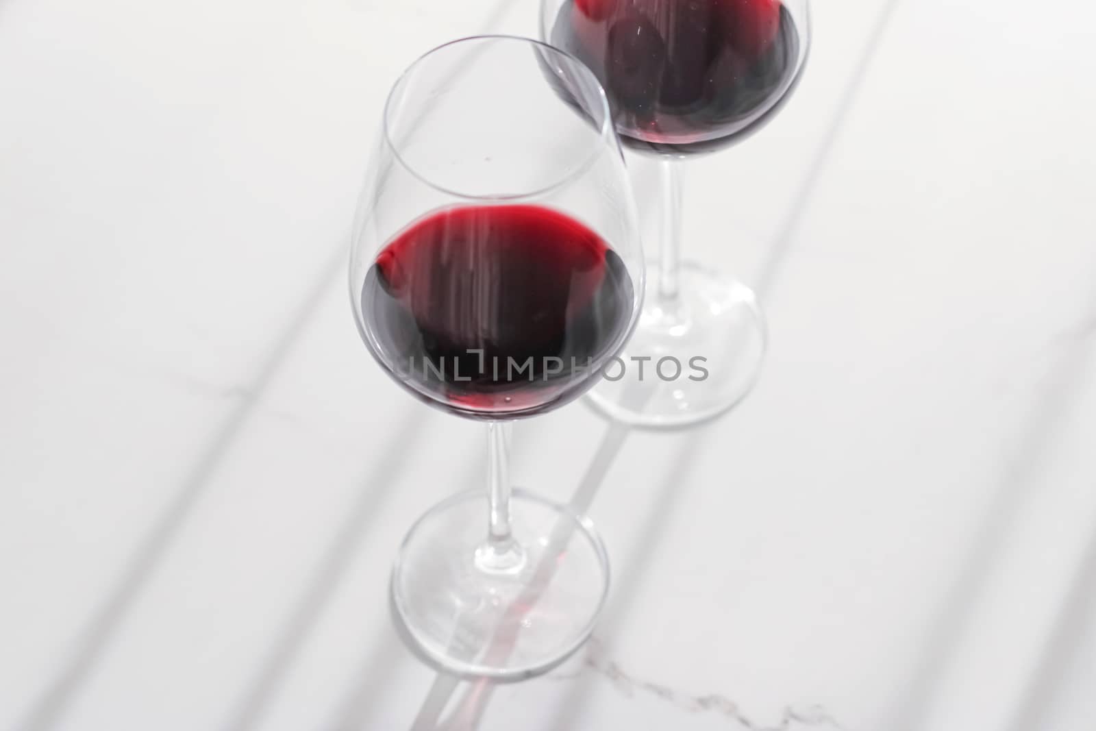 Two glasses of red wine, organic beverage product by Anneleven