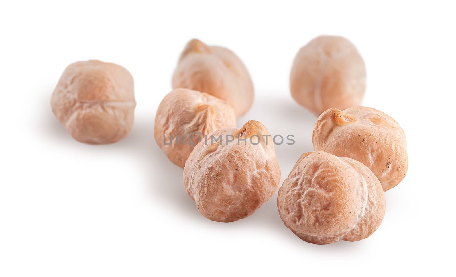 Several whole dry raw chickpea isolated on white background