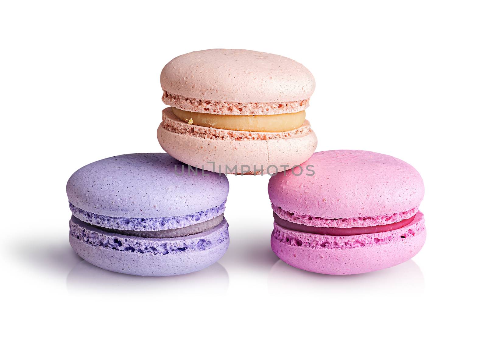 Three macaroons stacked in a pyramid by Cipariss