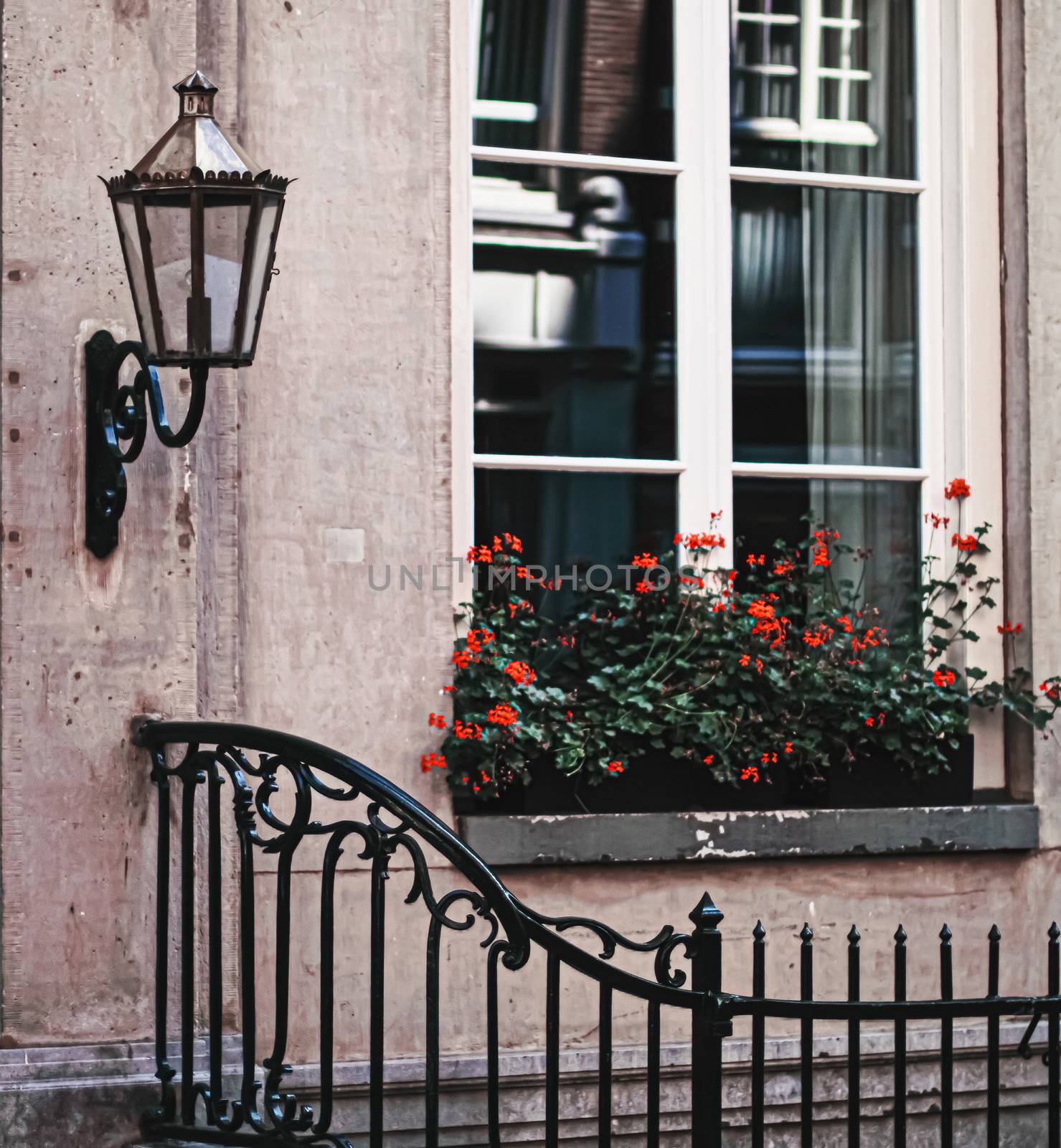 Architectural detail of a building on the main city center street of Amsterdam in Netherlands, european architecture