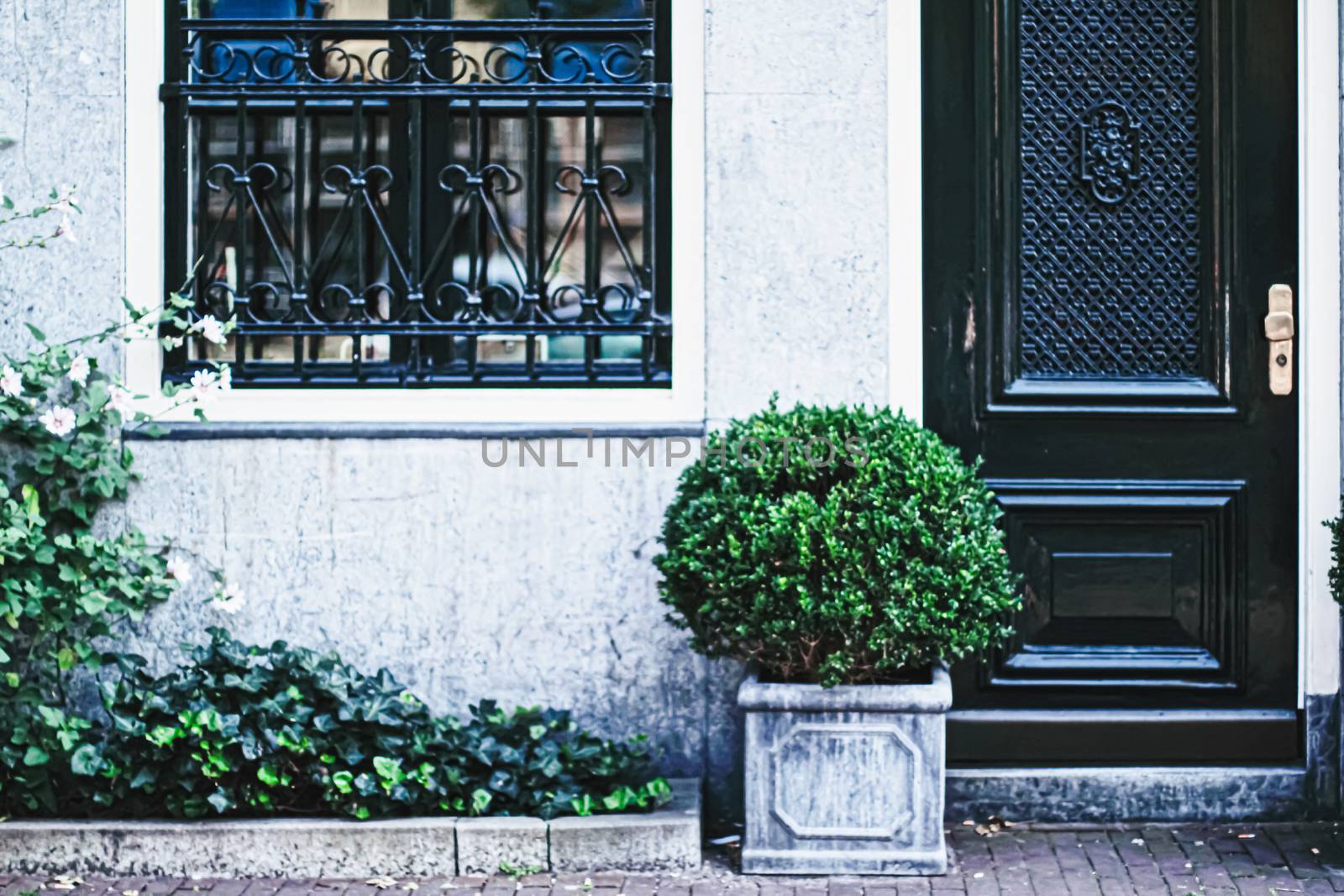 Architectural detail of a building on the main city center street of Amsterdam in Netherlands, european architecture