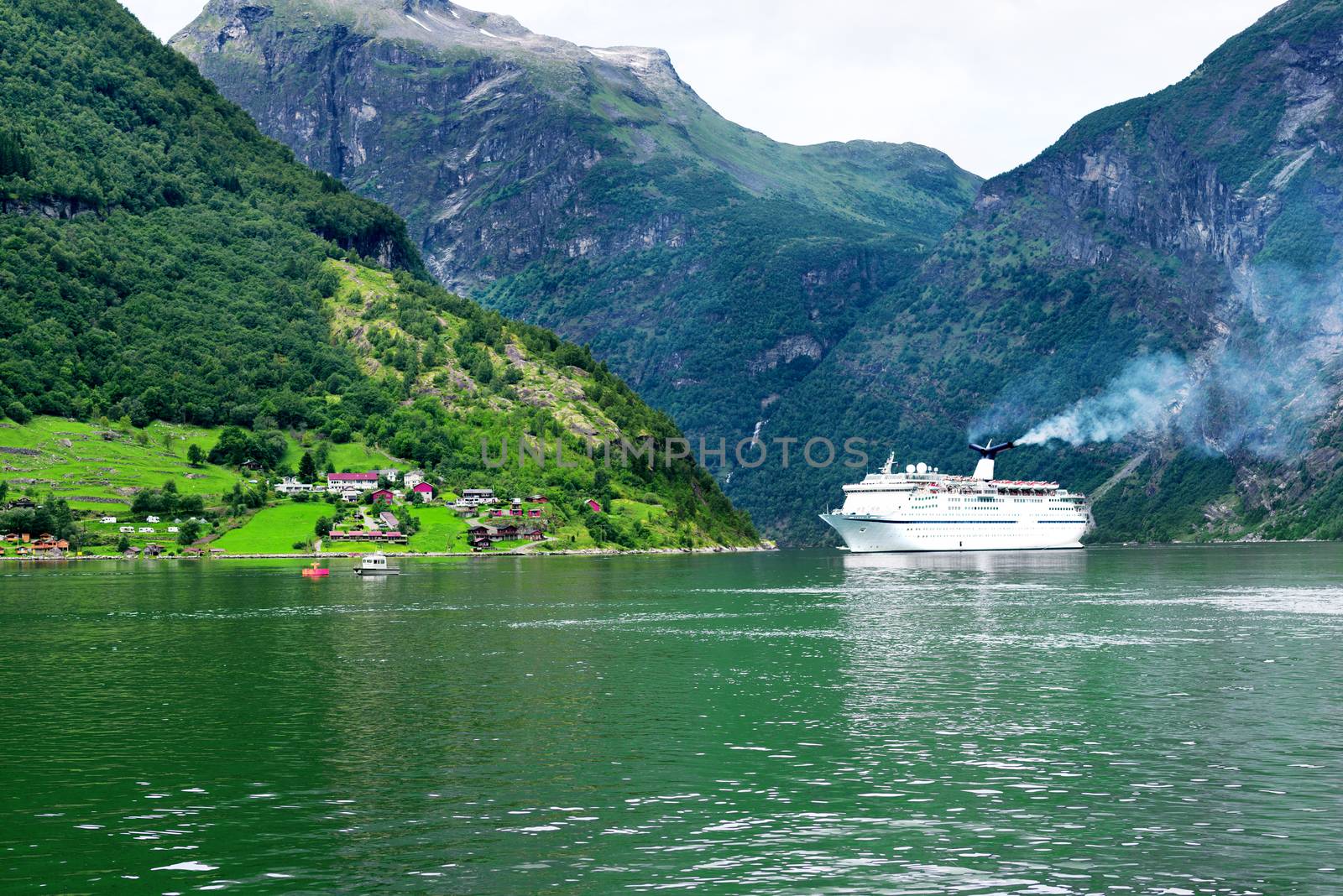 Cruise ship at Geiranger Fjord by Nanisimova