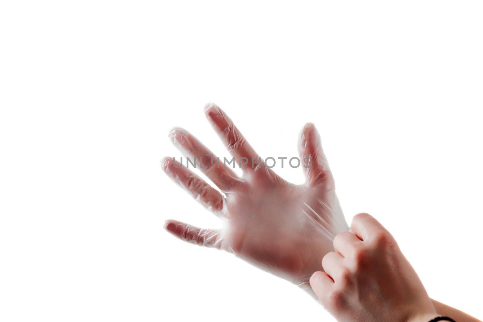 Hand in vinyl glove isolated on white background