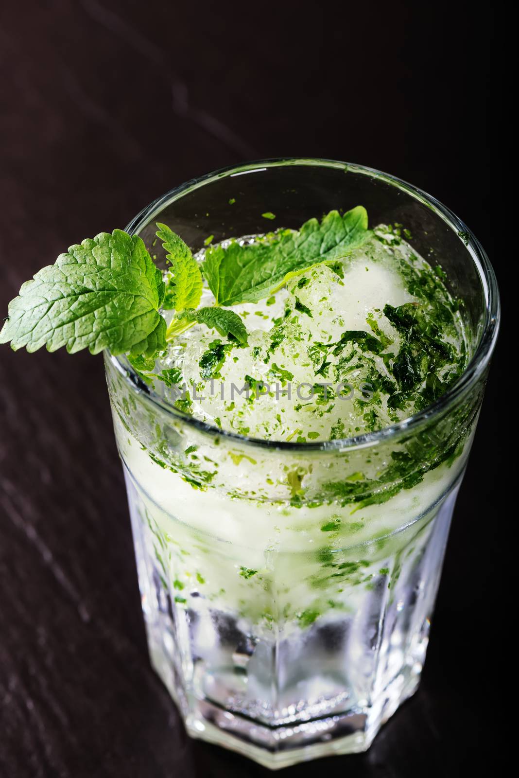 Mojito cocktail on a dark rustic table