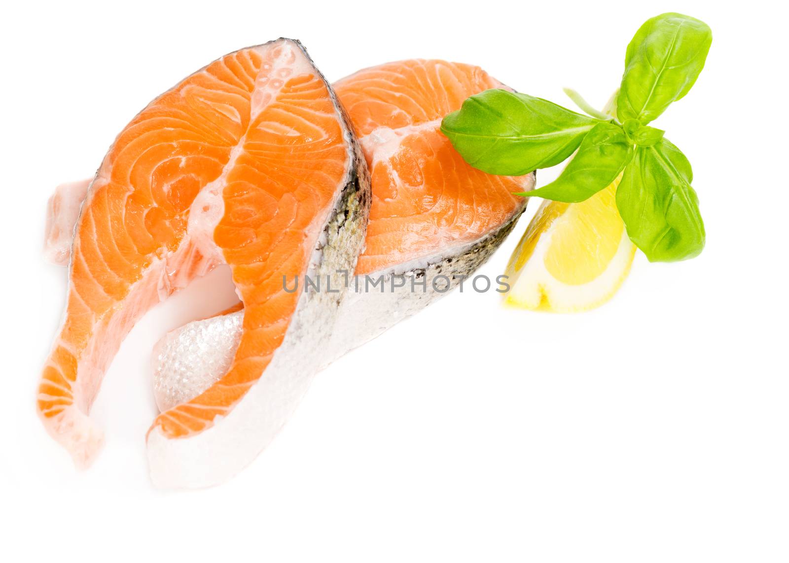 Salmon with basil and lemon isolated, copy space by Nanisimova