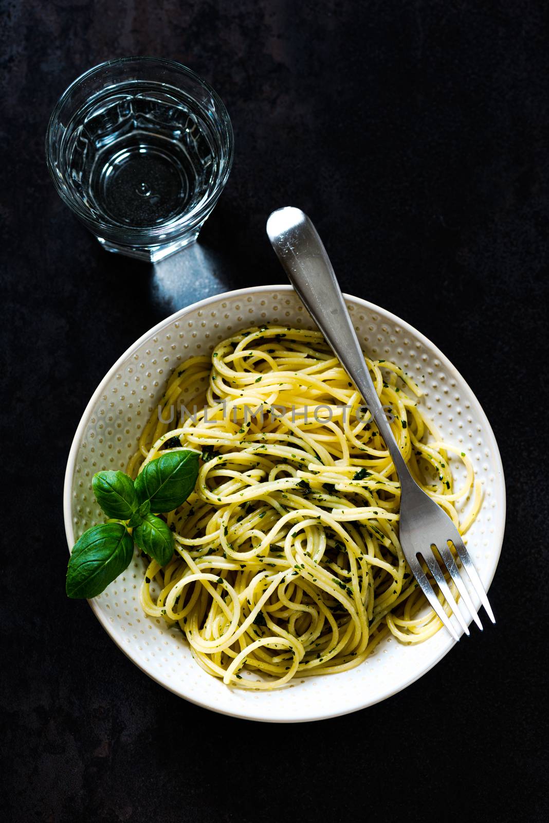 spaghetti pasta in a bowl by Nanisimova