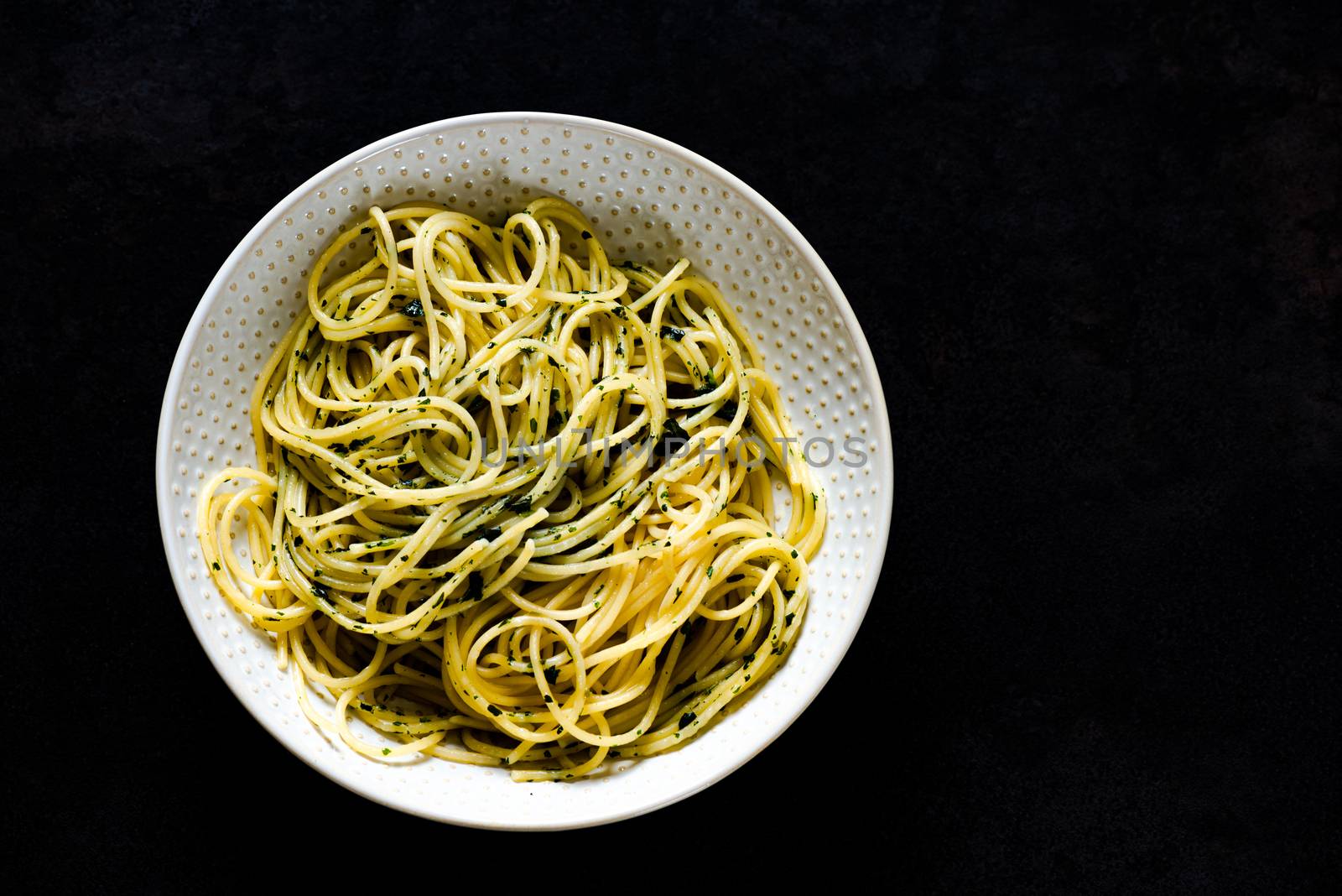 spaghetti pasta in a bowl by Nanisimova