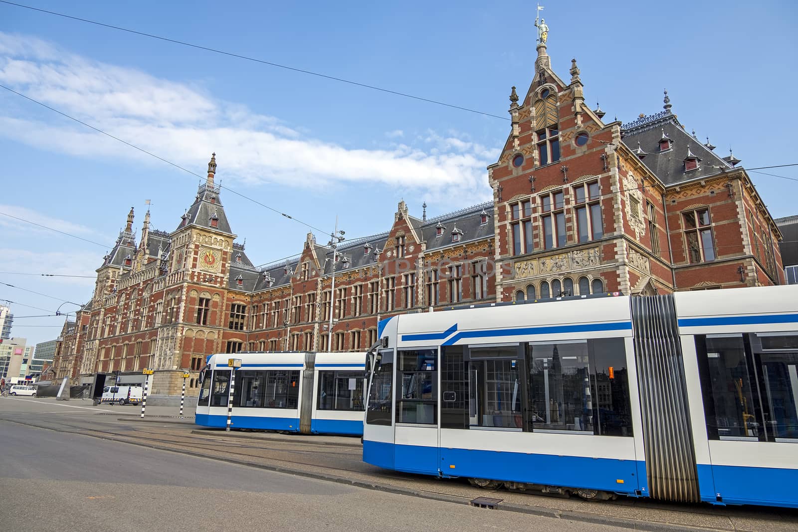 Trams at the central station in Amsterdam Netherlands