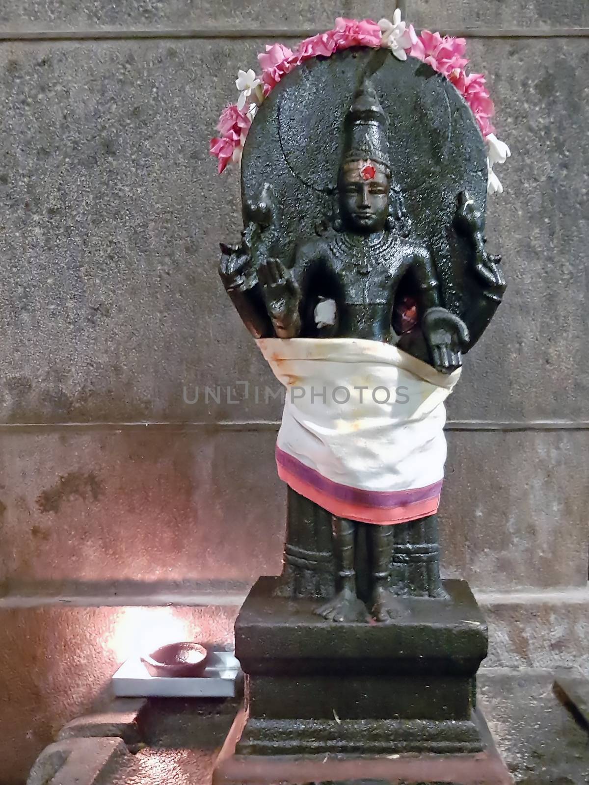 Ancient Shiva statue in the Ramana Ashram in Tiruvanamalai India by devy