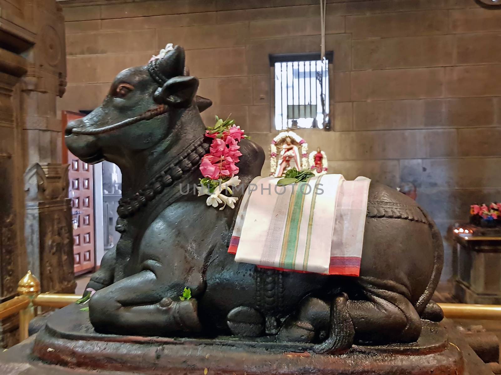 Ancient nandi statue in the Ramana Ashram in Tiruvanamalai India
