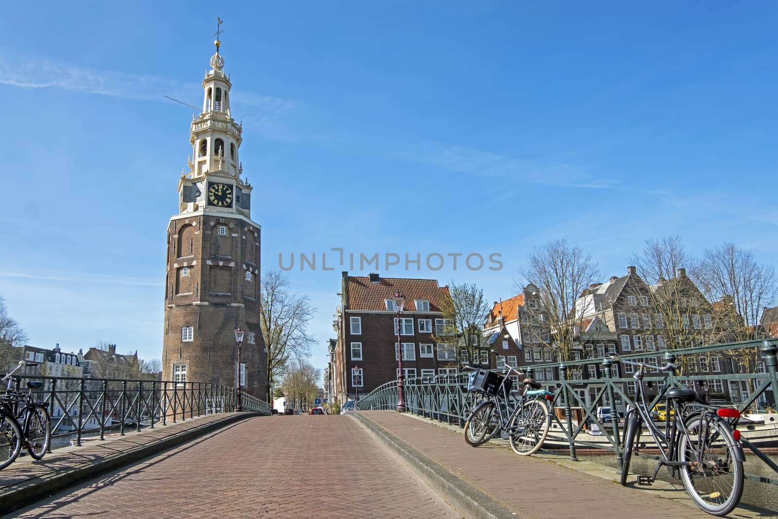 City scenic from Amsterdam in the Netherlands with the Montelbaan tower