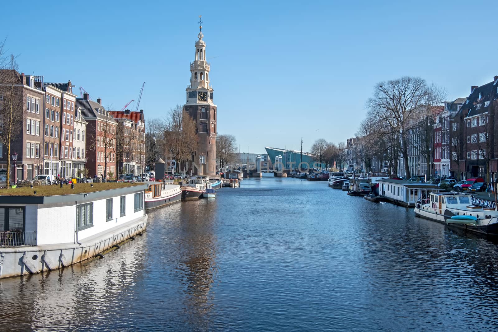 City scenic from Amsterdam in the Netherlands with the Montelbaan tower