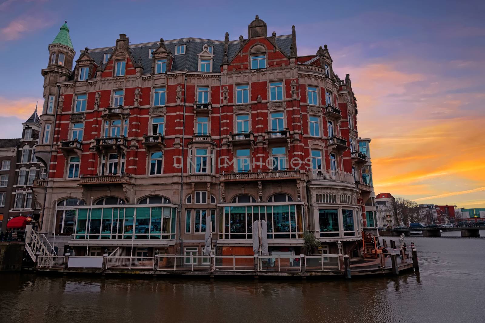 Medieval building along the river Amstel in Amsterdam Netherlands