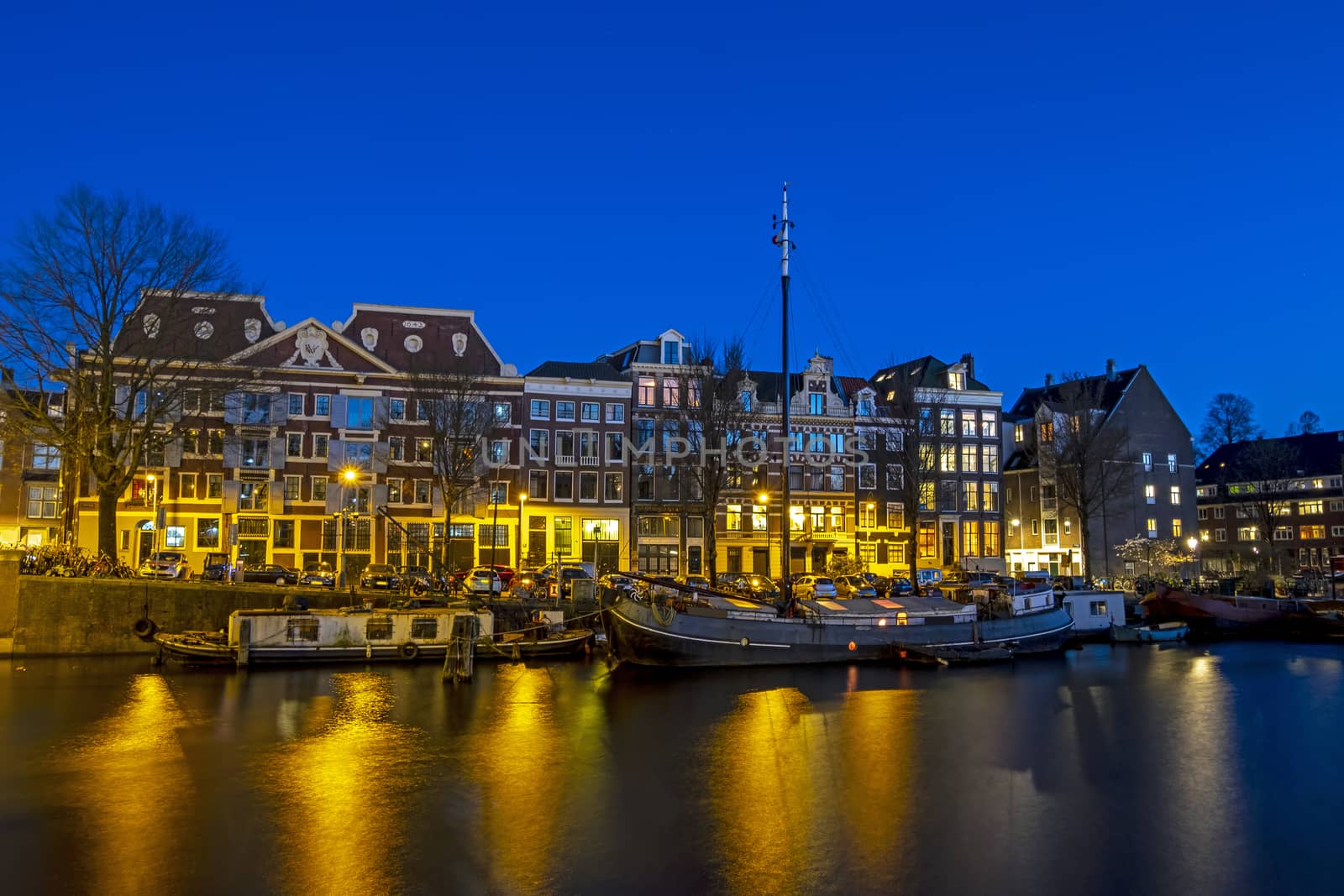 City scenic from Amsterdam with the in the Netherlands at sunset