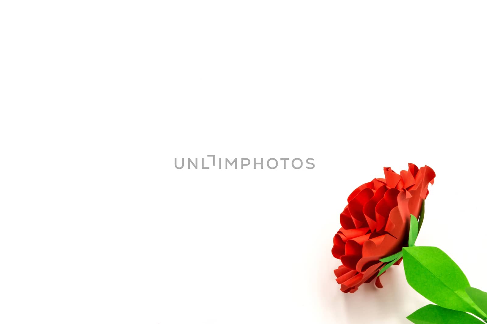 Red flower paper on isolated background with clipping path. Origami flower for your design.