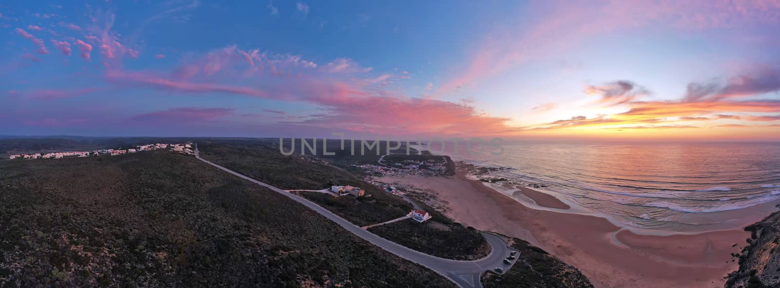 Panorama aerial from Monte Clerigo at the west coast in Portugal at sunset