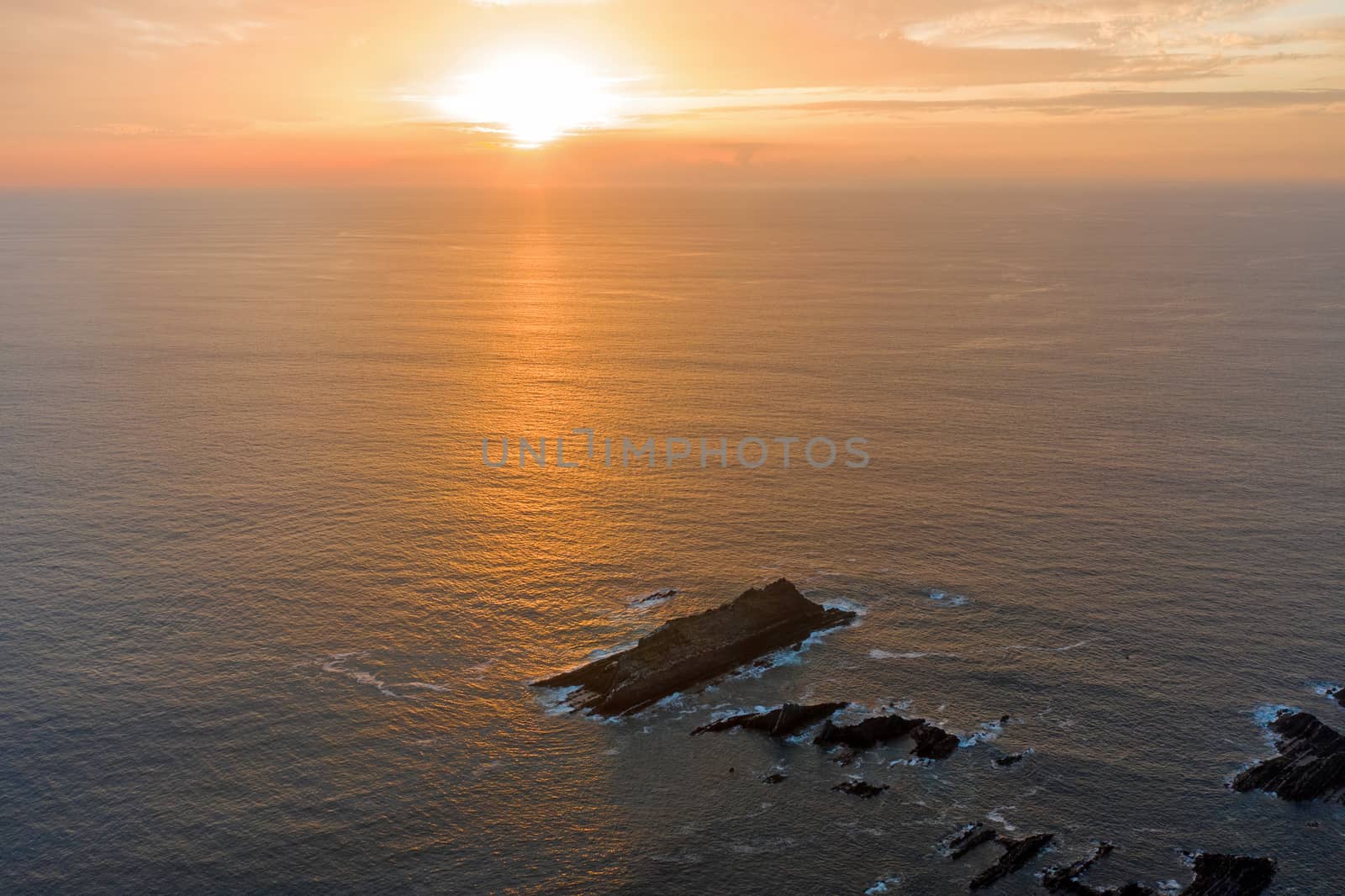 Aerial from a beautiful sunset at Arifana in Portugal