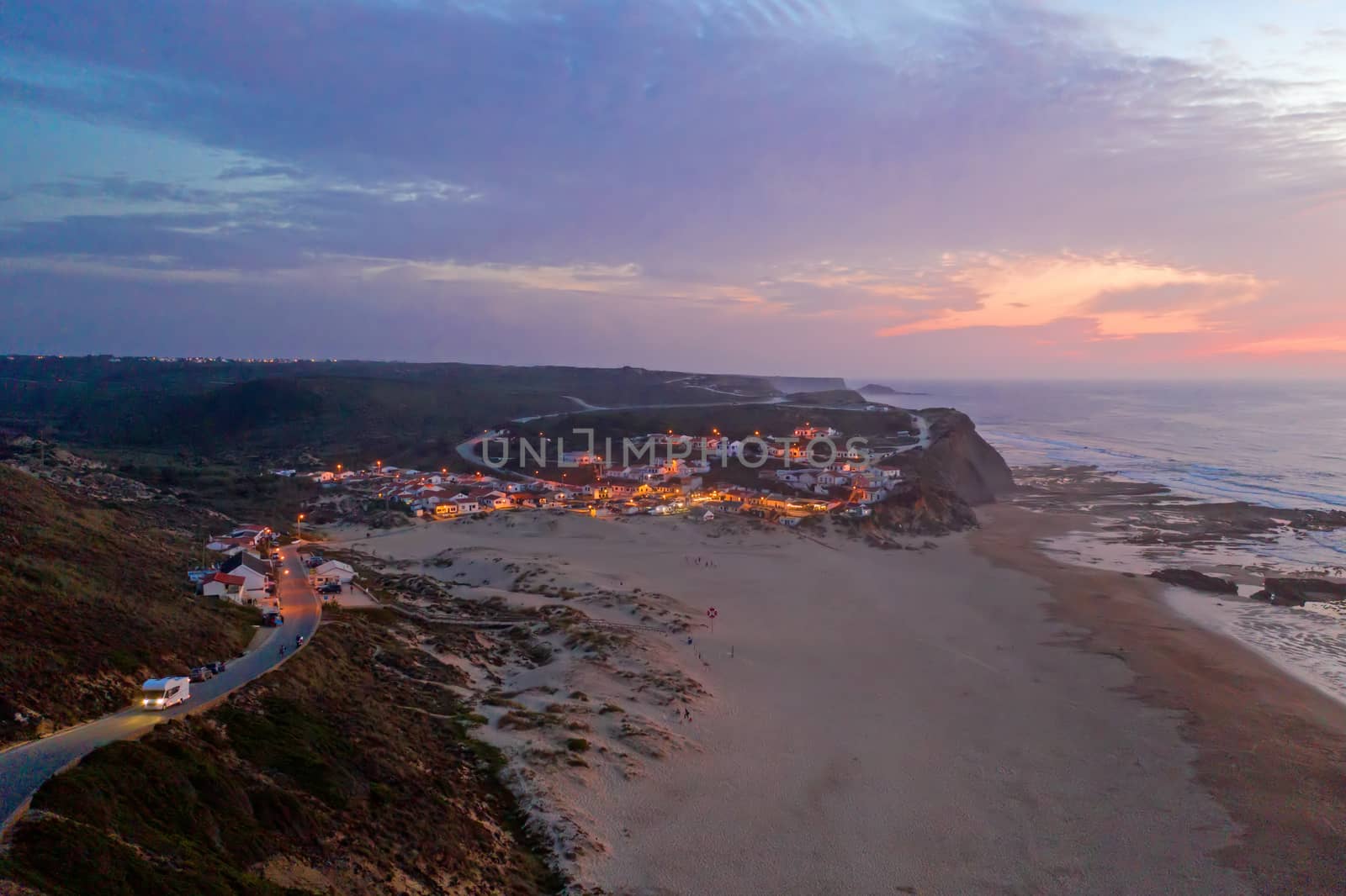 Aerial from Monte Clerigo at the west coast in Portugal at sunse