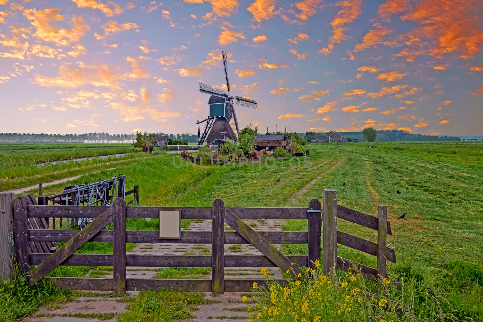 Landscape with a traditional windmill in the countryside from the Netherlands