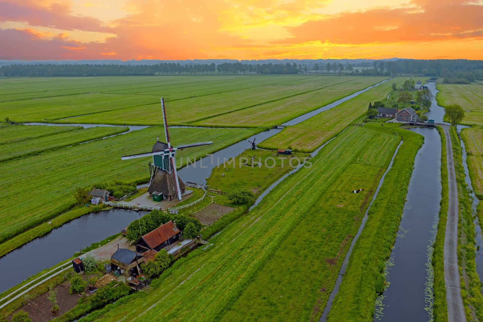 Aerial from a traditoinal windmill in the countryside from the Netherlands
