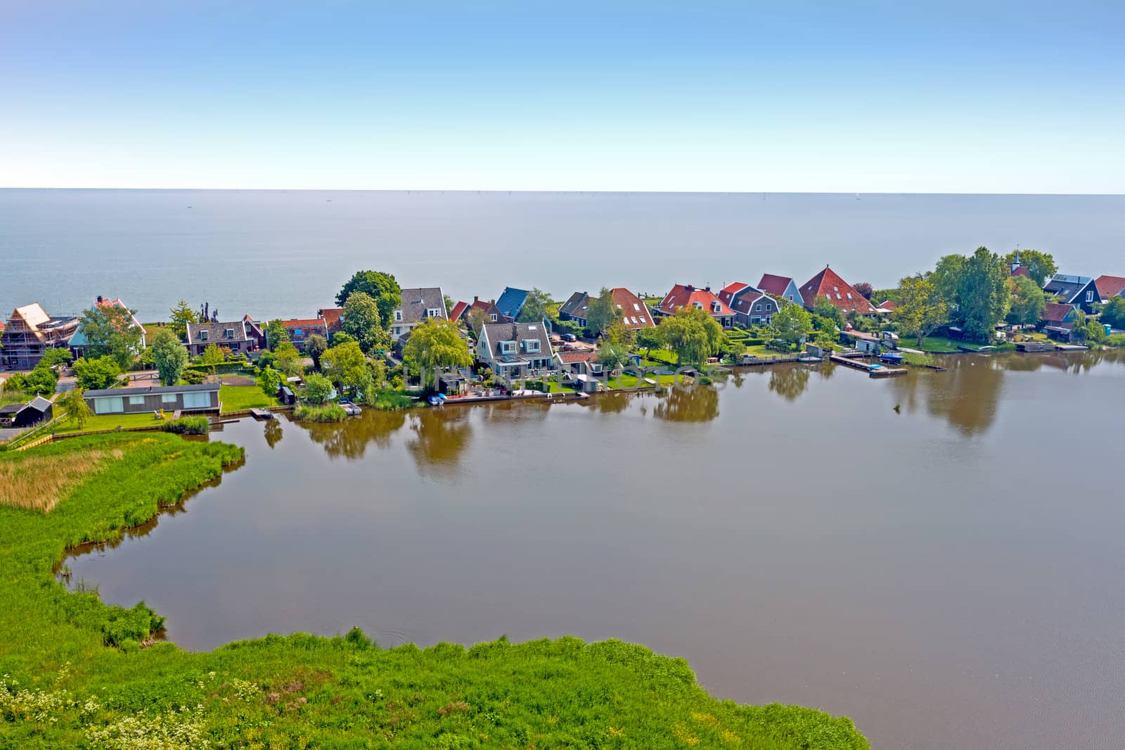 Aerial from the traditional village Uitdam at the IJsselmeer in the Netherlands