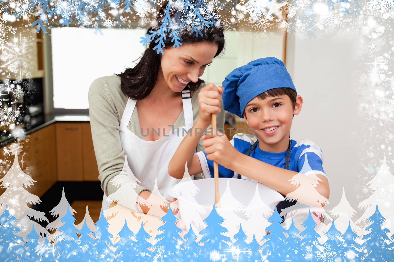 Composite image of mother and son having fun preparing a cake by Wavebreakmedia