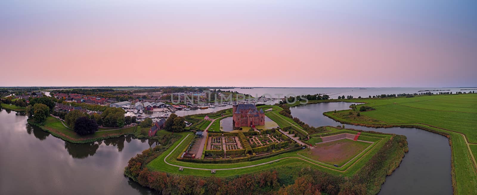 Aerial from medieval castle 'Muiderslot' in the countryside from by devy