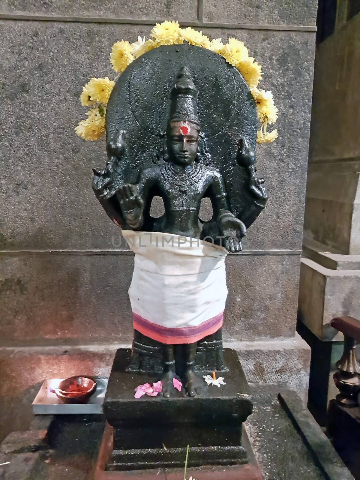 Ancient Shiva statue in the Ramana Ashram in Tiruvanamalai India by devy