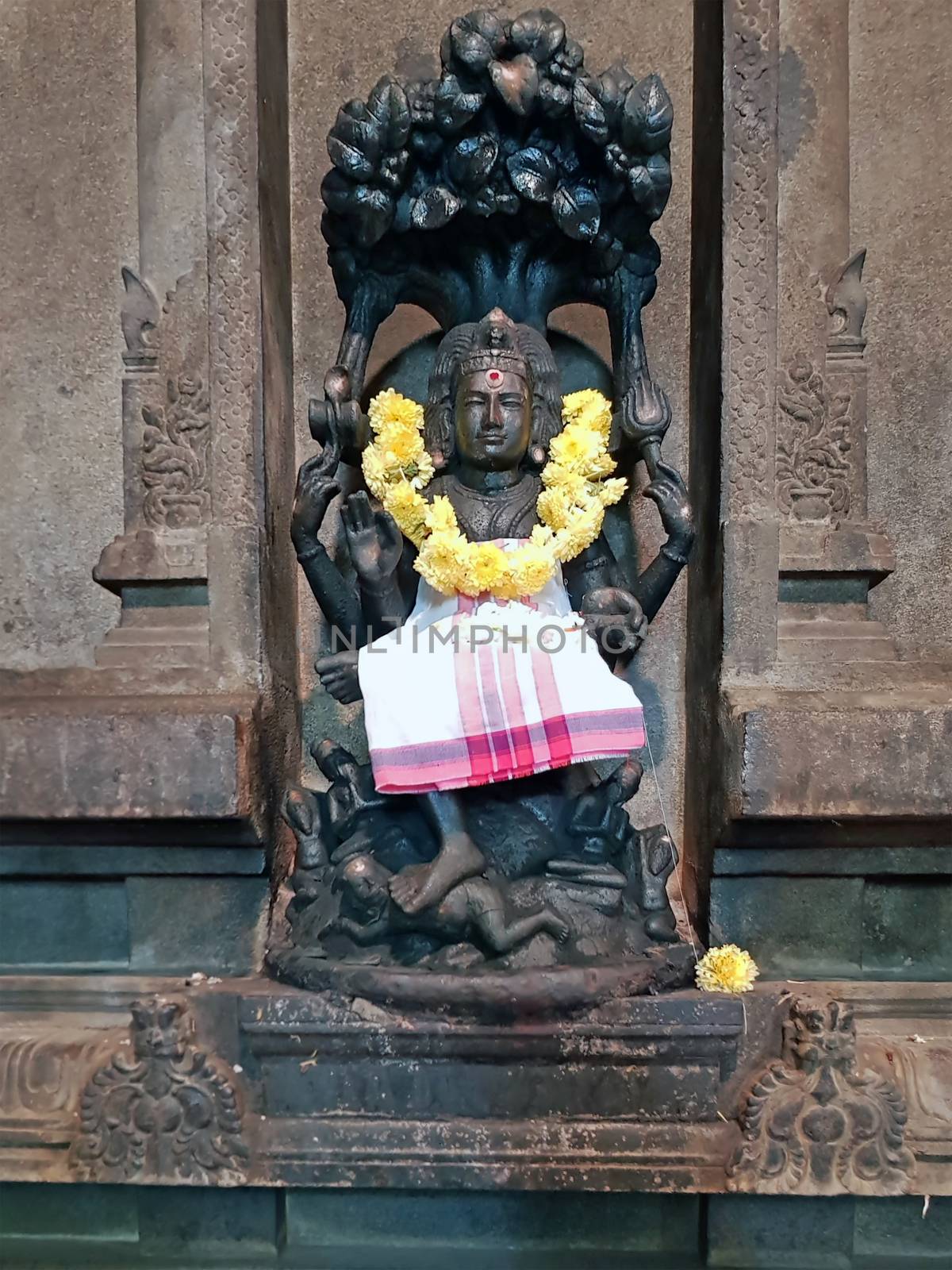 Ancient Shiva statue in the Ramana Ashram in Tiruvanamalai India by devy