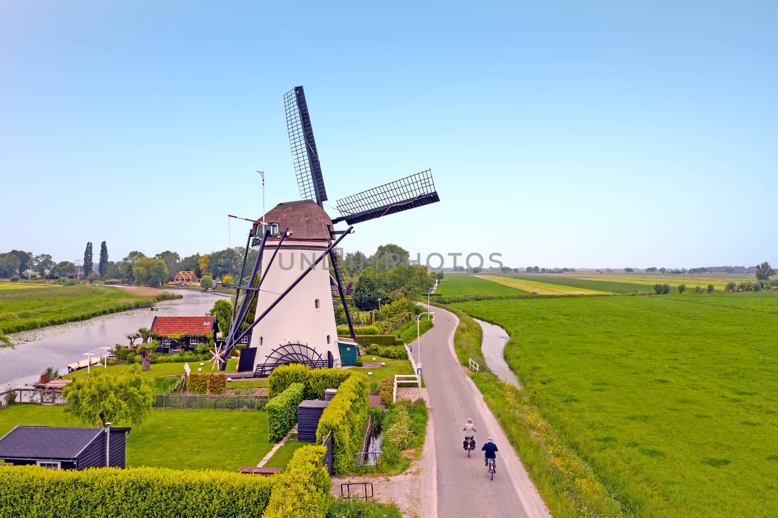 Aerial from a traditoinal windmill in the countryside from the Netherlands