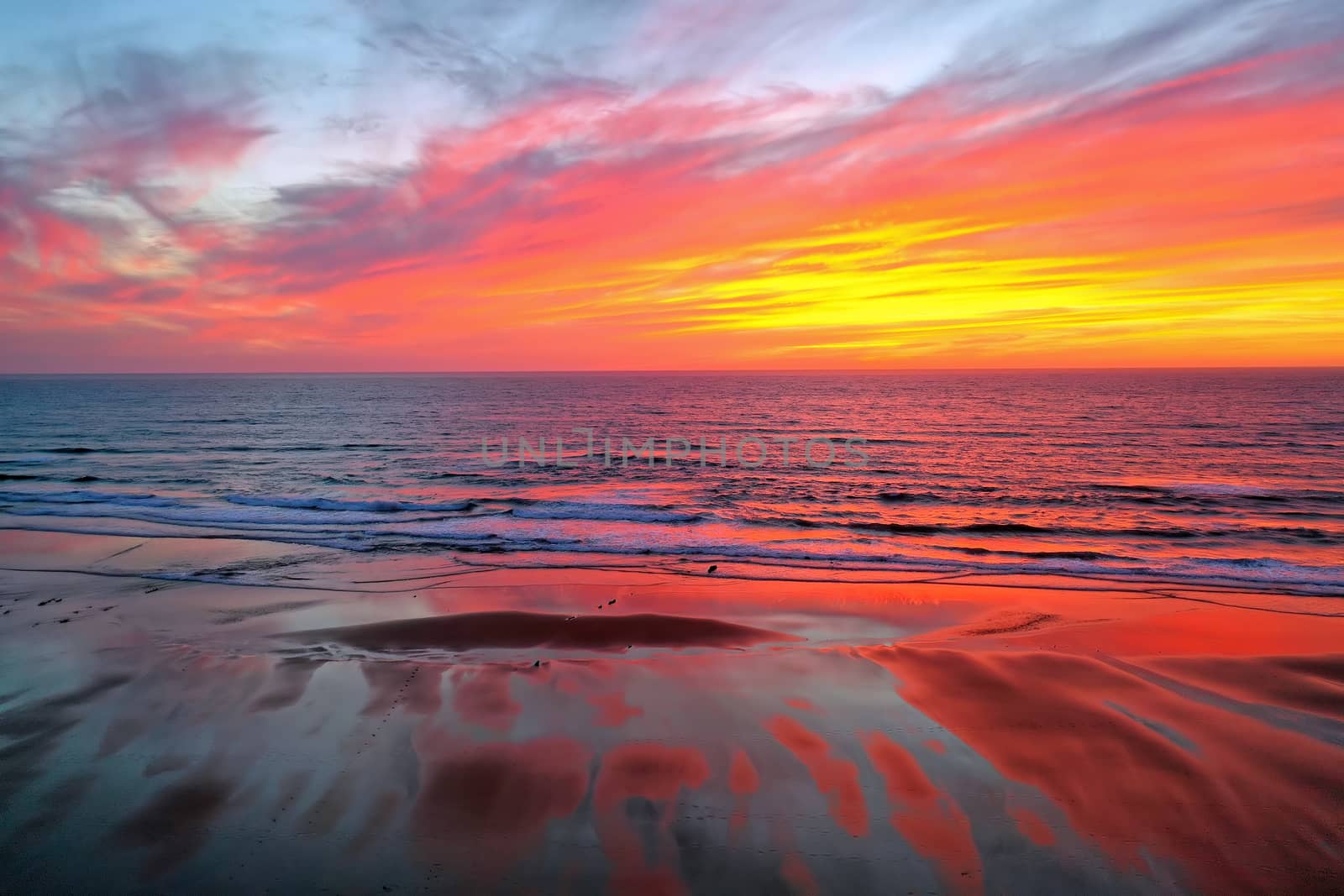 Aerial from Praia Vale Figueiras in Portugal at sunset