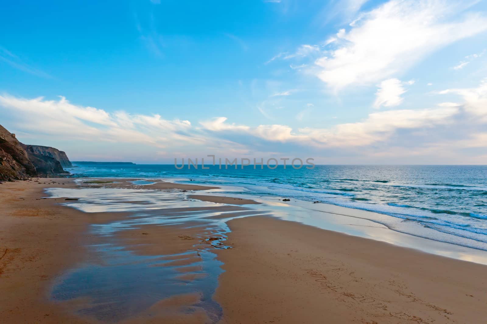 Aerial from Praia Vale Figueiras in Portugal at sunset