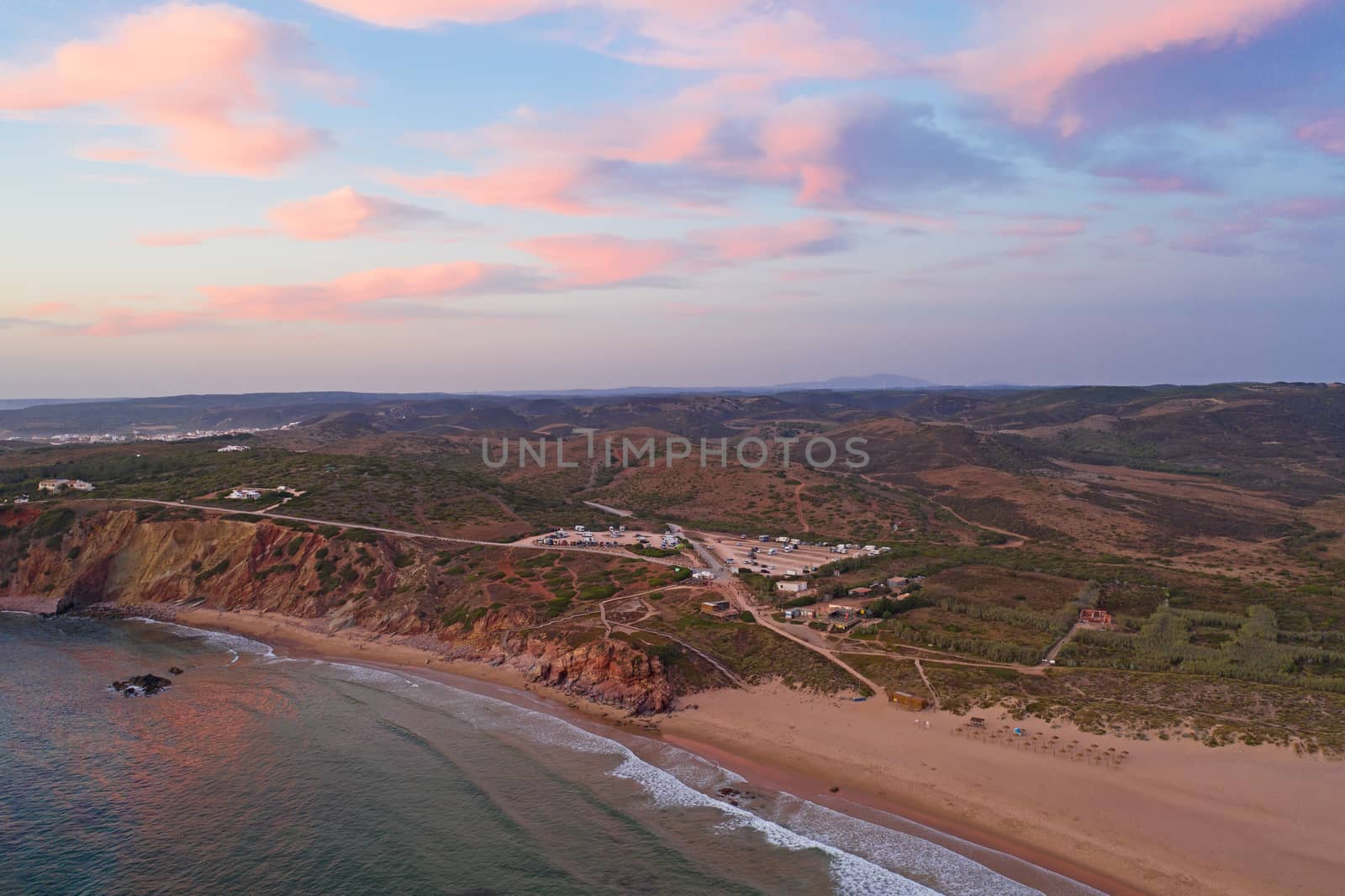 Aerial from Praia do Amado at the west coast in Portugal at sunset