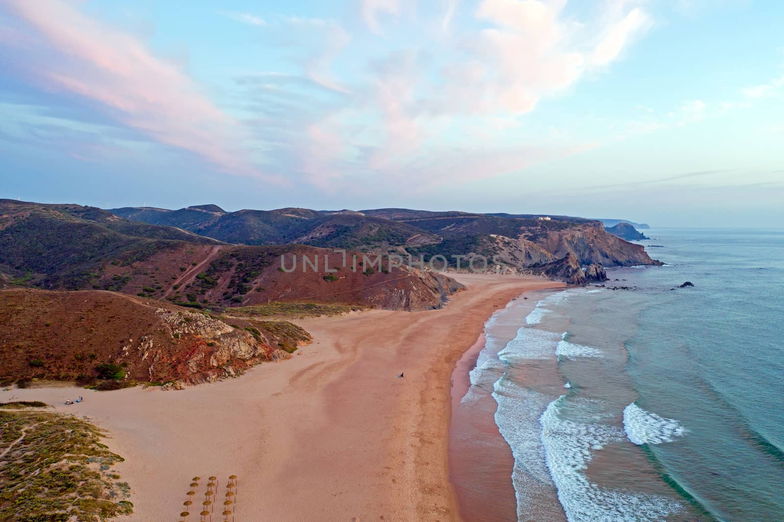 Aerial on Praia Amado on the west coast in Portugal at sunset by devy