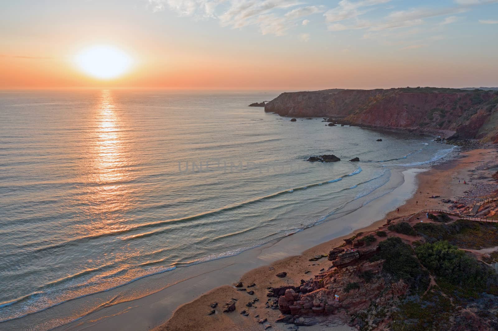 Aerial on Praia Amado on the west coast in Portugal at sunset