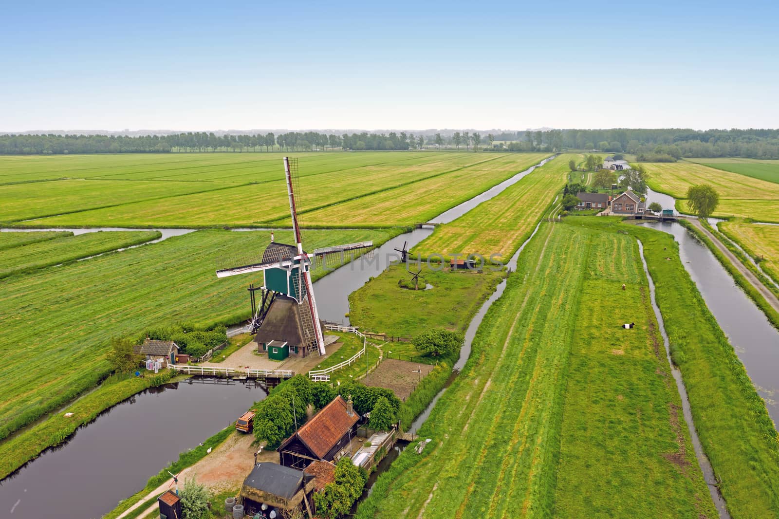 Aerial from a traditoinal windmill in the countryside from the Netherlands