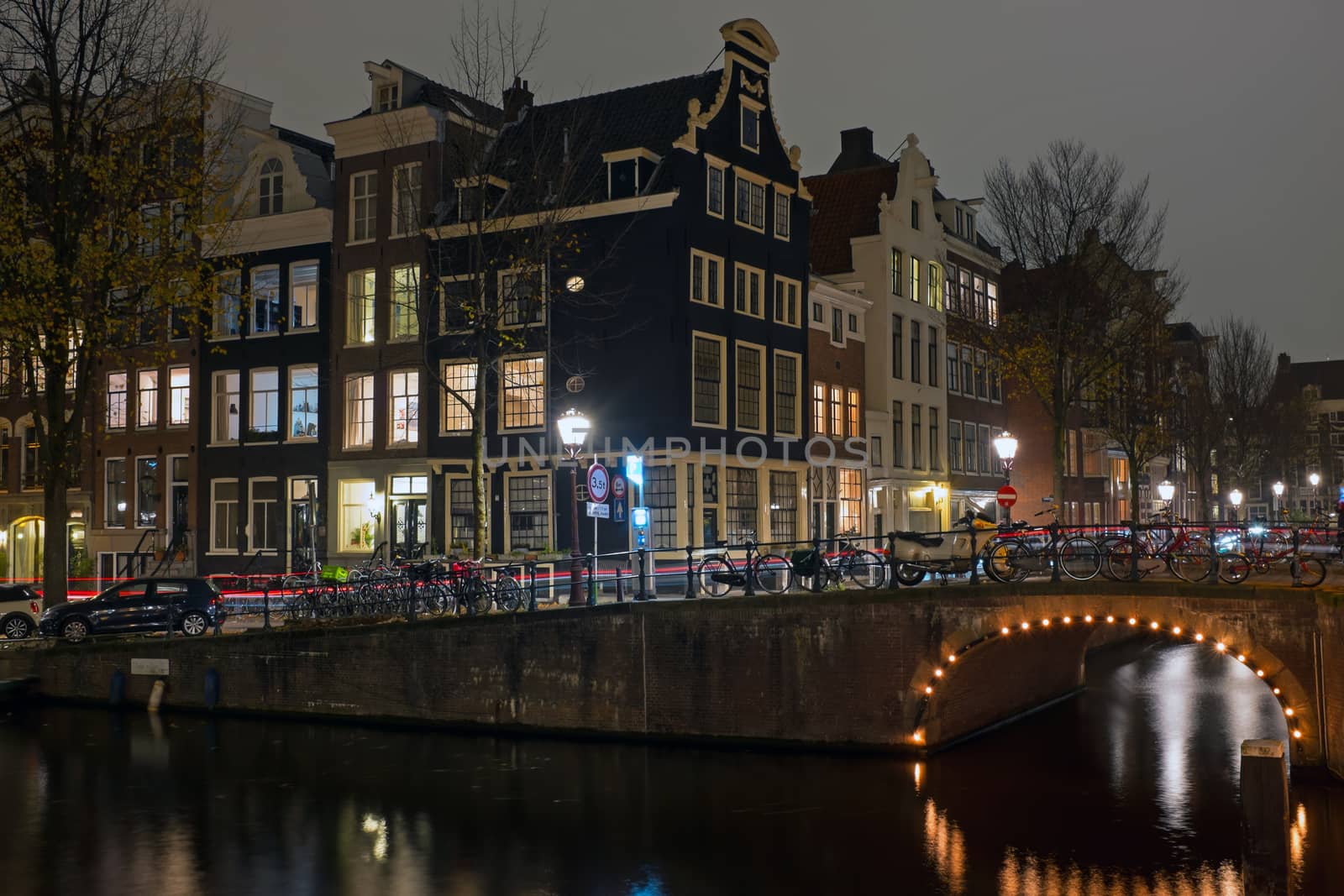 City scenic from Amsterdam in the Netherlands at night by devy