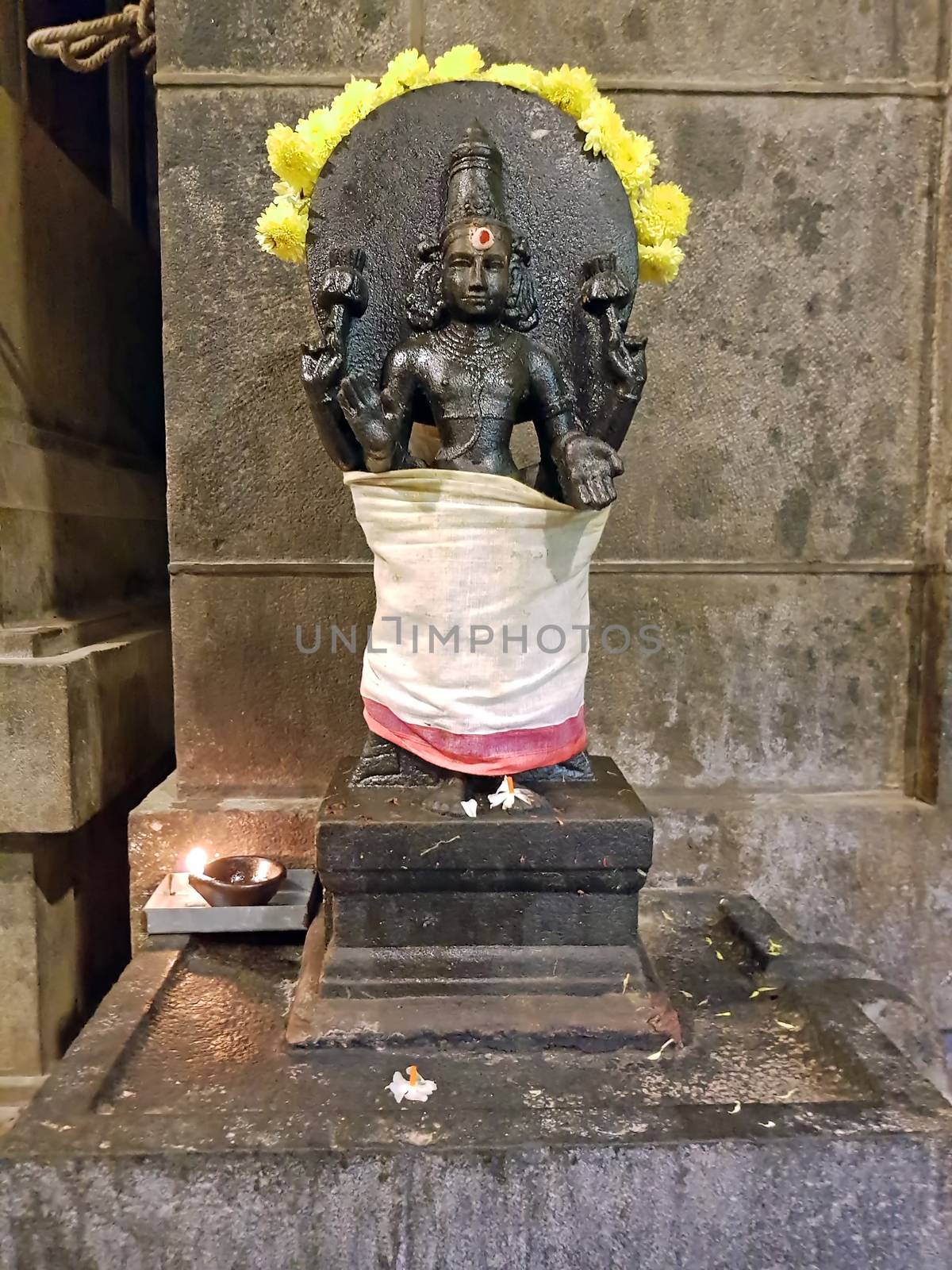 Ancient Shiva statue in the Ramana Ashram in Tiruvanamalai India by devy