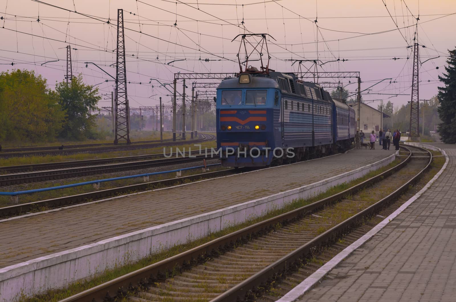 Slavyansk, Ukraine - september 13 2018: Passenger train on railway station by FoXovsky