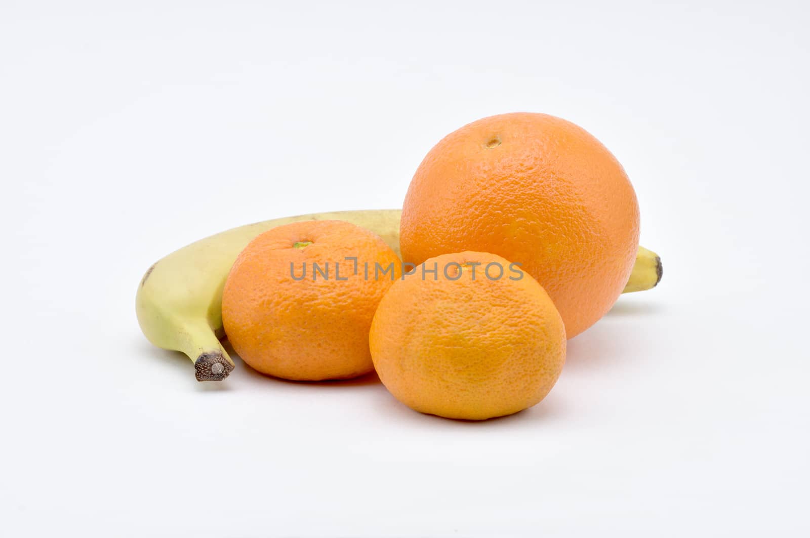 Mandarins,Orange,Banana on a white background.Natural.For Isolat by moviephoto